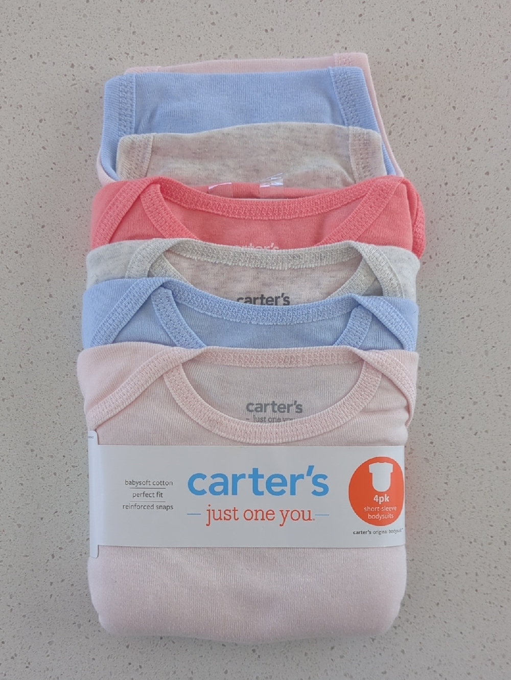 Carter's 4-Pack Short-Sleeve Bodysuits in Pink, Blue, Coral, Cream